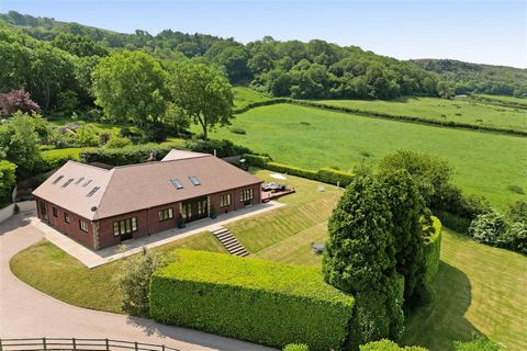 An immaculately presented modern detached family home, situated on the edge of the thriving village of Winscombe in an area of Outstanding Natural Beauty on the western side of the Mendip Hills. This stunning brick, built home, built in 2002, has bee...