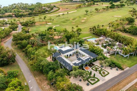 Elevate your lifestyle with the exquisitely designed Villa, situated on the premier Teeth of the Dog Golf Course's first hole, breathtaking partial ocean views, proximity to resort amenities, beach club, marina, and Altos de Chavon. Embrace the epito...