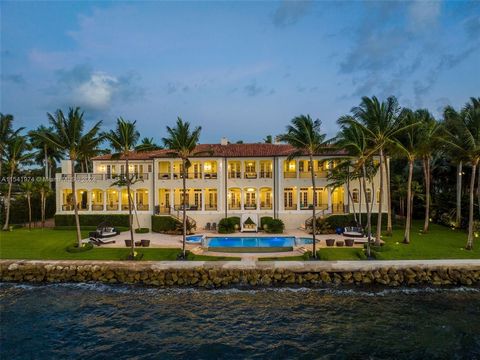 This magnificent 14,972-SF estate is on a lushly landscaped 35,389-SF lot in the highly desirable guard-gated community of Gables Estates, with 7 BR, 8.5 BA and 225 ft of waterfront. Designed to maximize the water views, the home offers breathtaking ...