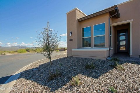 Unobstructed Views of the Majestic Four Peaks whether you step in or out of this highly upgraded Brand New Valletta Model at Trilogy. This 3 bed, 2.5 bath cul-de-sac residence has beauty and privacy with no neighbors at the back or the unattached sid...