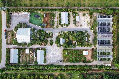 ~FARMHOUSE MIAMI~A 5 ACRE TURNKEY AGRI TOURISM VENUE SITUATED BETWEEN BISCAYNE NAT. PARK AND THE EVERGALDES, MINUTES FROM THE FL. KEYS. ON HEAVILY TRAVELED KROME AVE(SR997) W/ APPX 350FT. OF WELL LIT FRONTAGE PARKING ON SITE FOR+120 CARS. ENJOY FARM ...