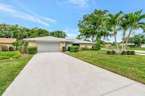 Spacious home located on one of the largest lots in the desirable Rainberry Bay active adult community. You'll be wowed by the expansive open floor plan in this light, bright home. Charming and roomy kitchen with a seated bar. Large owner's suite wit...