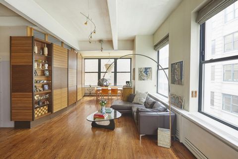Your waterfront oasis has arrived. Through the inviting foyer, the soaring 11' beamed ceilings frame a spacious environment which has been thoughtfully renovated. At apartment 4H, DUMBO loft living has been enhanced by custom crafted cabinetry and ha...