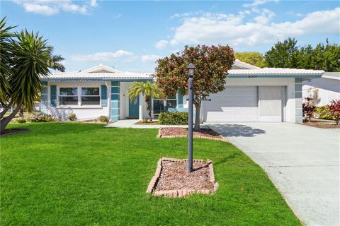 Enjoy the lifestyle at River Isles, an over 55 active community offering golf, many events & activities, clubhouse, game room, library, exercise room, community pool, shuffleboard courts and more. This corner lot 2BR/2BA well maintained home with ove...