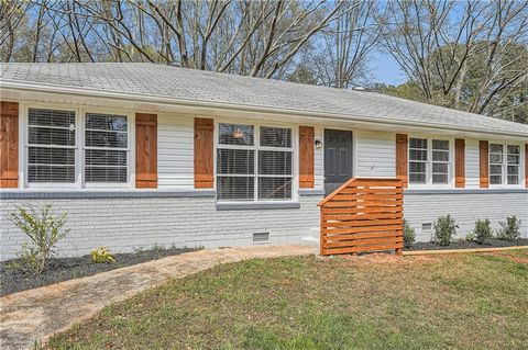 Welcome to your modernized mid-century oasis in sought-after Cobb neighborhood! This 4-bed, 2-bath home boasts a large backyard with endless potential. Step inside to find a beautifully updated interior, featuring a kitchen with white cabinets, under...