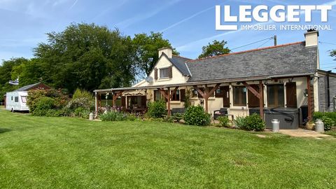 A21585MCW22 - This is a fantastic home with a large terrace, outbuildings, garage and stables set on a well-maintained plot equidistant from the market towns of Rostrenen and Callac, a short drive from Gouarec, close to the famous Corong gorges and h...