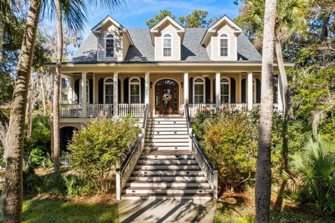 This charming, classic Lowcountry style home is situated on a very private, rare .76 acre lot overlooking the 11th Fairway of Seabrook Island's Crooked Oaks Golf Course. At just under 4,000 square feet, this home has a ton of living space, both indoo...