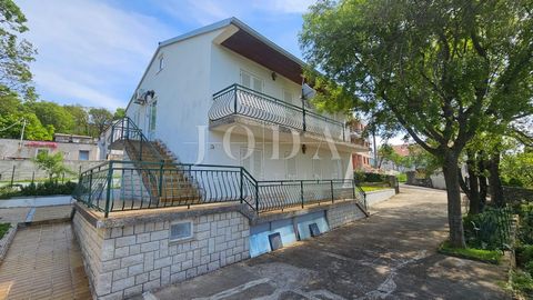 Location: Primorsko-goranska županija, Novi Vinodolski, Povile. HOUSE WITH TWO APARTMENTS IN POVILE A beautiful house with two separate residential units and a garage in a quiet location near the sea. Both floors consist of an entrance hall, three sp...