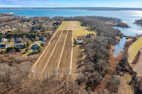 Nestled amidst the picturesque embrace of 30.13 acres of verdant farmland, this singular estate presents a tranquil retreat and a testament to serene living. The heart of this enchanting property is a gracious 2,700 square foot single-family home, ar...