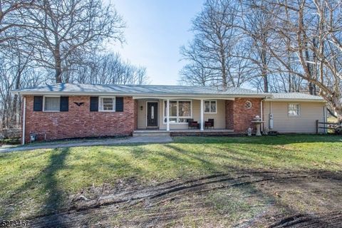 This welcoming ranch style home w/beautiful curb appeal is nestled on a 1/2 acre offering three bedrooms, one and half bathrooms, family/dining room addition and full size basement w/two car garage! The formal living room w/wood burning fireplace is ...
