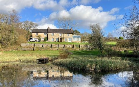 Nestled in scenic countryside just 3 miles south of Llandeilo, this exquisite country property awaits. Set within nearly 25 acres of mixed pasture and woodland, this delightful 4-bedroom residence offers captivating views over the lake and surroundin...