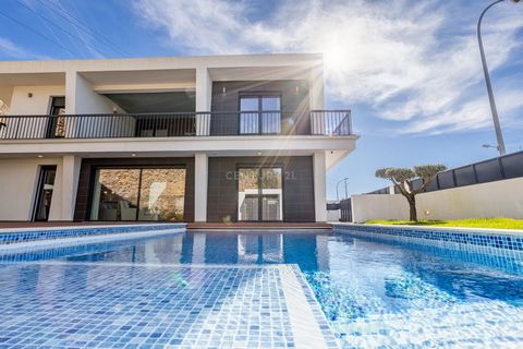 Contemporary 4-bedroom villa with luxury finishes, lawned garden, swimming pool and lounge area set in a 667 m2 plot in a quiet residential area of Belas. Main areas: Floor 0 . Entrance hall 8m2 . Living/dining room 55m2 with direct access to the gar...