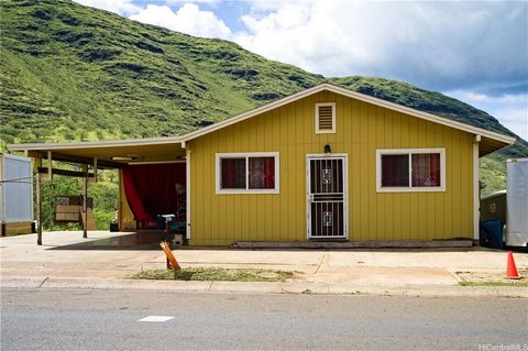 Located in Nanakuli Valley, directly across the entrance of Nanakuli High School. Enjoy mountain and ocean views at the same time! The is a Department of Hawaiian Home Lands property. Buyer must be approved through DHHL.