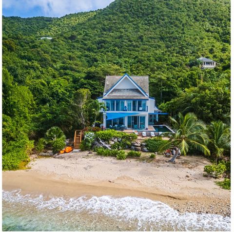 Azure Wish, located within the exclusive Nail Bay Estate Community, is a one-of-a-kind beachfront, true 