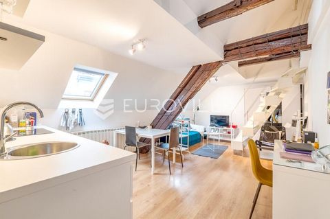 Radićeva, in one of the most beautiful locations in Zagreb, in the heart of the city, there is a unique 53.4 m² apartment located in the attic of a historic building from the 19th century. The building was built to order by merchant Ćiril Suknarić, a...