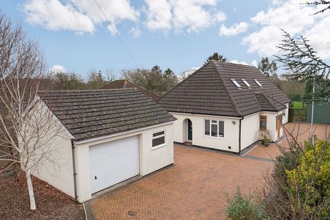 Located on the outskirts of the village in a semi-rural setting, this detached chalet-style home offers spacious and versatile living areas, perfectly tailored for family life. The property features a generously sized mature garden, secure fencing, s...