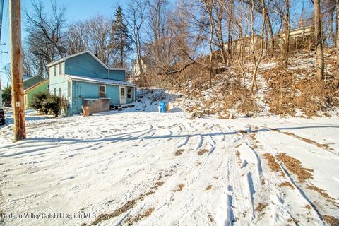 Prime Real Estate Opportunity! Located just off Delaware Ave, this single-family, two-story home is minutes from the Waterfront community, beach, dog park, rail trails, Hutton Brick Yard, and trendy eateries. Offered as-is, it's a blank canvas ready ...