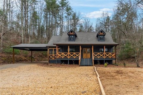 Discover your ideal retreat at this fully renovated mountain home, nestled on a private end-of-the-road lot with no HOA or restrictions! Experience the perfect blend of modern style and rustic charm in the brand-new designer kitchen, featuring an imp...