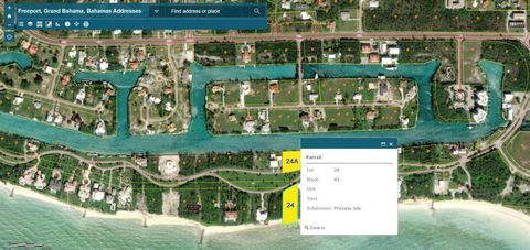 Located inside the Premier gated community of Princess Isle, this property offers the best of both beachfront and canal front living. Lot 24 features 150ft of beachfront and 1.21 acres of land while the adjacent canal lot offers over 100ft of water f...