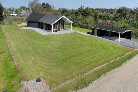 Holiday cottage on a good, open natural plot close to Aalborg. Well equipped kitchen in open connection to the living room with modern furnishings and dining area. Bathroom with whirlpool for 2-3 people.