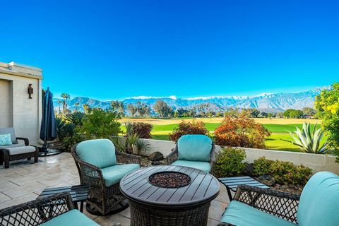 Stunning Mountain and Lake Views across Multiple Fairways of the Famed Tournament Course at Mission Hills Country Club and Stylish Renovation with Designer Furnishings and a Santa Barbara Ambiance. Enter the property through a gated courtyard with cu...