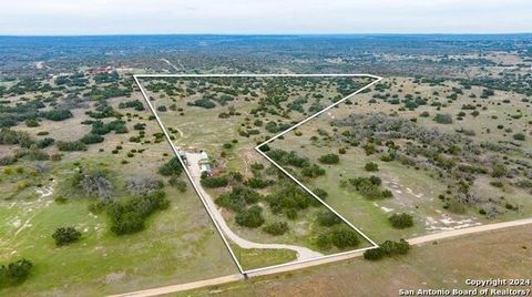 98 +/- Unrestricted Acres in Hill Country - Cabins, Wildlife, Seasonal Creek,& Infinite Potential! Just 4 miles from Hwy 290 and less than 30 minutes to Fredericksburg, I-10, or Kerrville, offers an unparalleled blend of off-grid living and modern co...