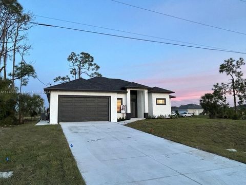 STUNNING NEW CONSTRUCTION 4 Bedroom, 2.5 Bathroom, 2 Car Garage Home located in Cape Coral. Comes with IMPACT DOORS &WINDOWS which leads you into SPACIOUS OPEN FLOOR PLAN. Many upgrades like STAINLESS STEEL appliances, QUARTZ counter tops, pendant/ r...