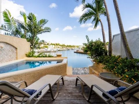 A secluded courtyard, with a fountain set among lush foliage, sets the mood for this tranquil villa. From the tastefully decorated living and dining room the view of the sea, in hues from turquoise to indigo, takes your breath away. Overlooking the w...