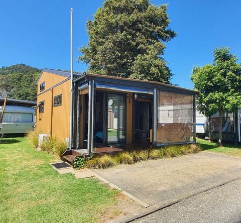 Set amongst the Te Puru Holiday Park Village is D20. Fitted out just like a styli tiny home, D20 offers a full kitchen, bathroom/toilet, large lounge/living/bedroom area and an upstairs spacious loft bedroom. Ranch sliders open onto a covered deck ar...