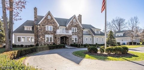 One of a kind! Custom manor home, 5+ BR, 6.1 baths with 40 mile sweeping views was designed as a paradigm of indoor/outdoor living. Stunning exterior is graced with fieldstone, newly painted cedar siding, new lighting & curved drive. The interior has...