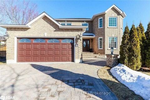 Welcome to this stunning all-brick, 2462 sq ft., 2-storey home located in the quaint town of Elmvale, where luxury, comfort, and convenience converge effortlessly. Perfectly situated just 10 minutes from the shores of Wasaga Beach, and a quick 20-min...
