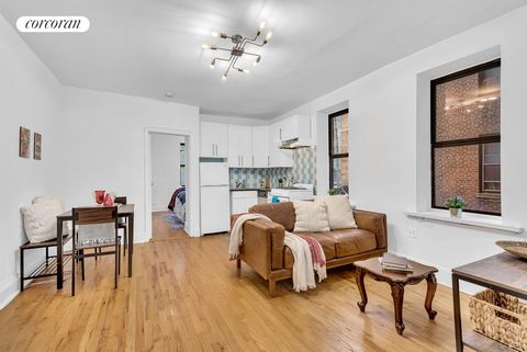 Experience the tranquility and allure of this remarkable one-bedroom home in Hudson Heights! Nestled above street level, this charming home offers a serene escape in the heart of the city. The open concept kitchen seamlessly blends with the living sp...