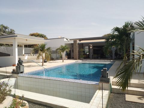 This bright contemporary villa built in 2020 and located in a residential area will offer you beautiful interior and exterior spaces with a living area of 300m² and its nicely wooded land of 1700m². The villa includes 3 bedrooms, 2 of which are indep...
