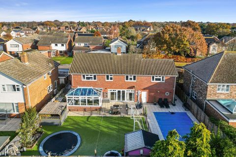 THE PROPERTY This extended five bedroom detached home is located in the sought after village of Wickham Bishops. It offers over 2,200sq.ft of accommodation and includes three reception rooms, an outdoor heated swimming pool, and a double garage. On t...