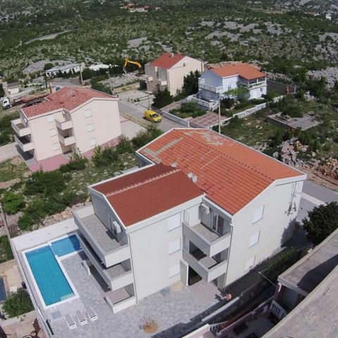 House with 9 apartments in Cesarica, Karlobag 150 meters from the sea, with sea views and heated swimming pool! Newly renovated house with nine apartments with total area of 460 sq.m.. Land plot is 400 s.qm. The house spreads over three floors, insid...