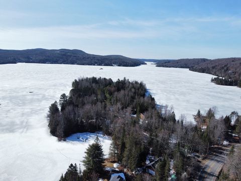 WATERFRONT. Land located on a peninsula in the large bay of the coveted Lac Labelle with an area of more than 34,000 square feet. Its topography is ideal for the construction of your dream cottage and you will benefit from a friendly waterfront for t...