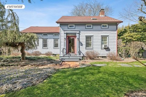 You'll find contemporary comfort and classic North Fork charm in this unique 1850s restored home. Boasting an inviting open floor plan and a gourmet eat-in kitchen adorned with wide plank floors. This residence seamlessly combines an historic feel wi...