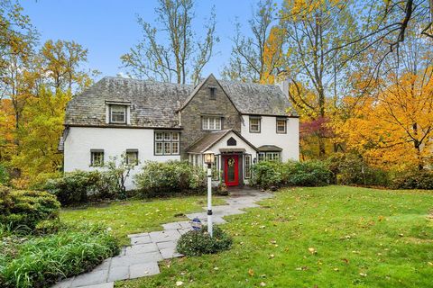 Embrace the suburban living with this stunning Tudor-style sanctuary, nestled in a coveted enclave renowned for its charm and community spirit. This breathtaking abode offers an unrivaled fusion of elegance and comfort, boasting 5 generously sized be...