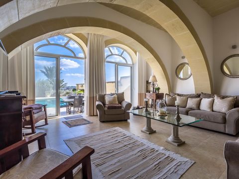 Highly finished house of character set in a prominent area of the town of Sannat in Gozo. Entrance through a most welcoming hallway leading to the kitchen and an amazing mill room hosting the dining living area and overlooking the swimming pool and o...