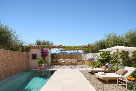 Newly built home with fantastic terraces and garden in the charming village of Santa Maria. This property combines Mallorquin architecture with modern-day comforts and is laid out over 254 square meters of living space, includes a beautiful garden wi...