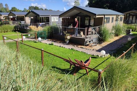 The family-friendly holiday home with property is fenced 1m high for dogs and is in the first row, with a clear view of the forest.