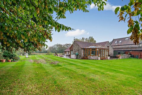 Enter a world of refined living at Plenty's Farm, an exquisite stone-built detached property nestled upon a sprawling one-acre private plot with breathtaking countryside views. Situated in the idyllic village of Kingston Seymour, this magnificent pro...