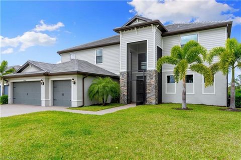 DESIRABLE WYNWOOD FLOORPLAN ON AN OVERSIZED, CUL-DE-SAC HOMESITE WITH PRIVATE, PRESERVE VIEWS IS AVAILABLE FOR IMMEDIATE OCCUPANCY IN THE PLACE AT CORKSCREW! This Spacious home offers 5 Bedrooms + Den, Loft, 4 Full Baths, Powder Bath, 3 Car Garage, E...