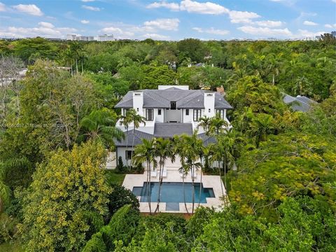 Magnificent completely renovated estate in the prestigious Stonegate guard-gated community in Ponce-Davis, with six bedrooms, six bathrooms, two half-bathrooms, and 7,164 sq ft of total space, with timeless design elements. The classic floor plan gre...