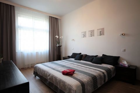 The 80 sq.m. recently renovated apartment is located on the 5th floor of Prague's historical building. It has two spacious bedrooms, kitchen/dining room, bathroom, toilet, and a small balcony. The house was built in 1925 and has a rich history and au...