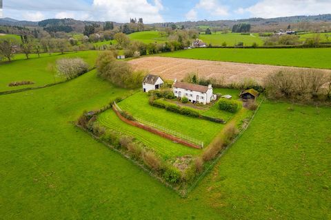 A detached, elevated, period cottage occupying a spectacular countryside location, set in circa 0.8 acres in a beautiful, secluded valley in west Worcestershire with a wealth of potential. There is a 1.3 acre paddock available via separate negotiatio...