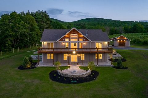 Enjoy the distant vistas and the pastoral setting at this impressive new home. On nearly ten acres with two lots of record and an 800-apple tree orchard backdrop, you will experience privacy yet convenience to all Gilford town amenities. Being just m...