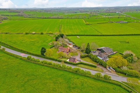 Hill Farm is an amazing property consisting of a fantastic four double bedroom farmhouse and a two double bedroom cottage, all within approximately four acres of beautiful gardens and grounds, including a 2.6-acre paddock and useful barn with adjoini...