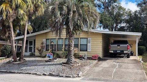 Welcome home to this charming 2 Br./2 Ba. manufactured home located in Lake Helen Villa a 55 plus community. This home features a spacious kitchen with stainless steel appliances and a large living room with vaulted ceilings and a large side screen r...