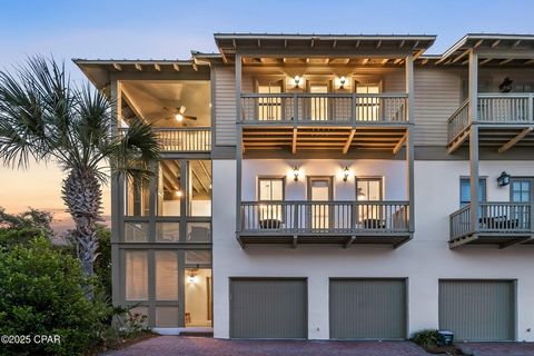 Coastal elegance with Gulf views in the coveted community of Sunset Beach on 30A. Discover your dream coastal retreat along the picturesque Scenic Highway 30A. This stunning impeccably-maintained, three-story home offers three bedrooms, four full bat...